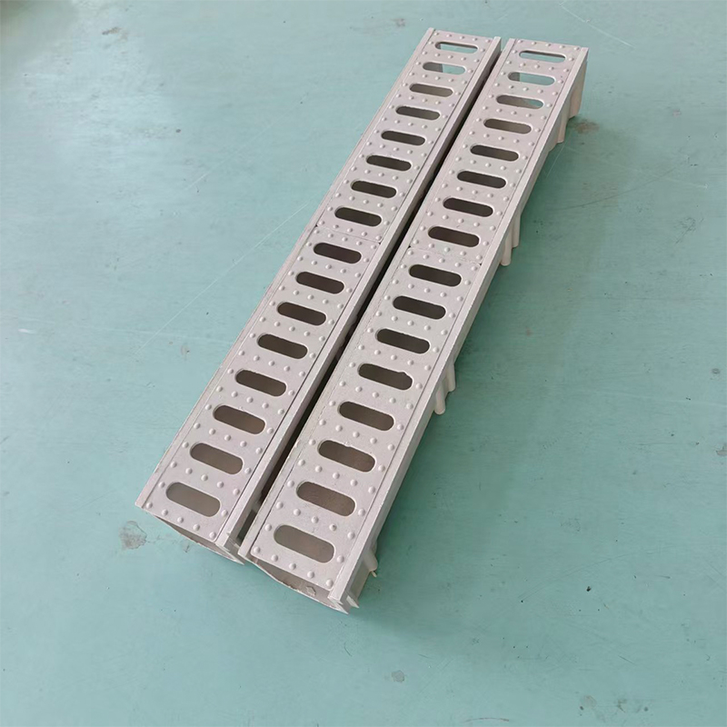 What building codes or standards govern the installation of resin drainage channels?